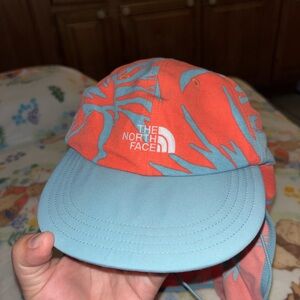 The North Face Orange and Blue Hat